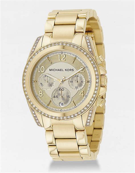 michael kors ladies watch . Quartz. Gold Plated Stainless Steel